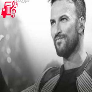 دانلود آهنگ آهنگ adımı kalbine yaz از تارکان + متن ترانه