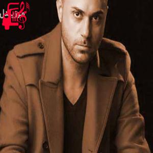 دانلود آهنگ آهنگ وقتی شب از کوچه رد شد از حمید حامی + متن ترانه